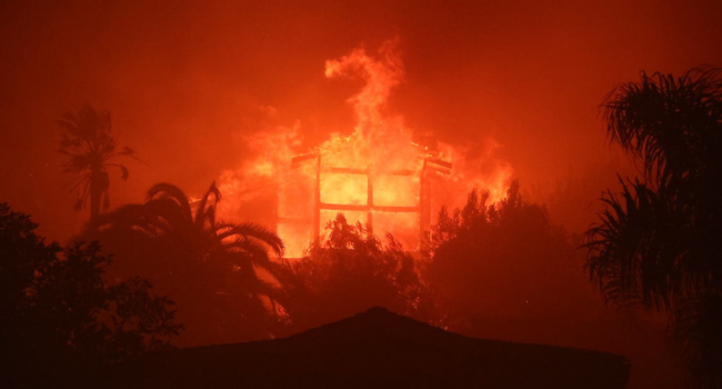 A structure fire caused by the wildfires in Los Angeles. 